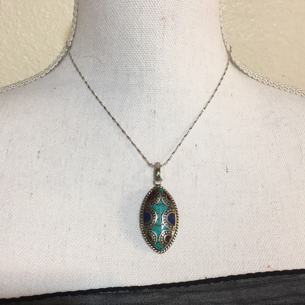 Tibetan motif pendant